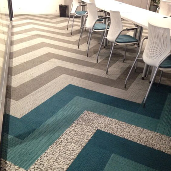 Mixture of grey and turquoise carpet planks