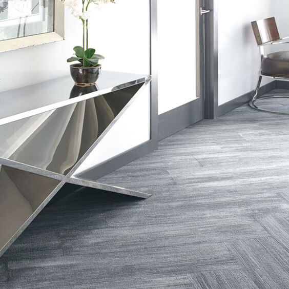 Grey wood-effect carpet plank