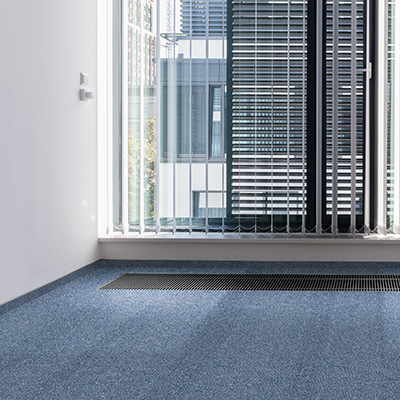 Carpet tile samples turned into a mug coaster