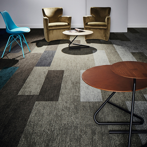 Bare feet on kitchen floor tiles with underfloor heating