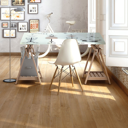 Bare feet on kitchen floor tiles with underfloor heating