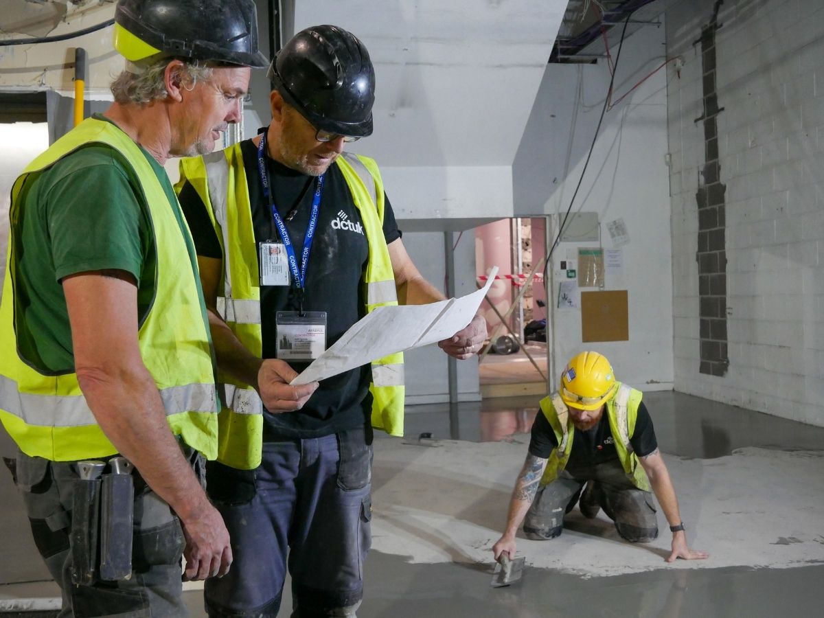 DCTUK fitters installing commercial flooring on site